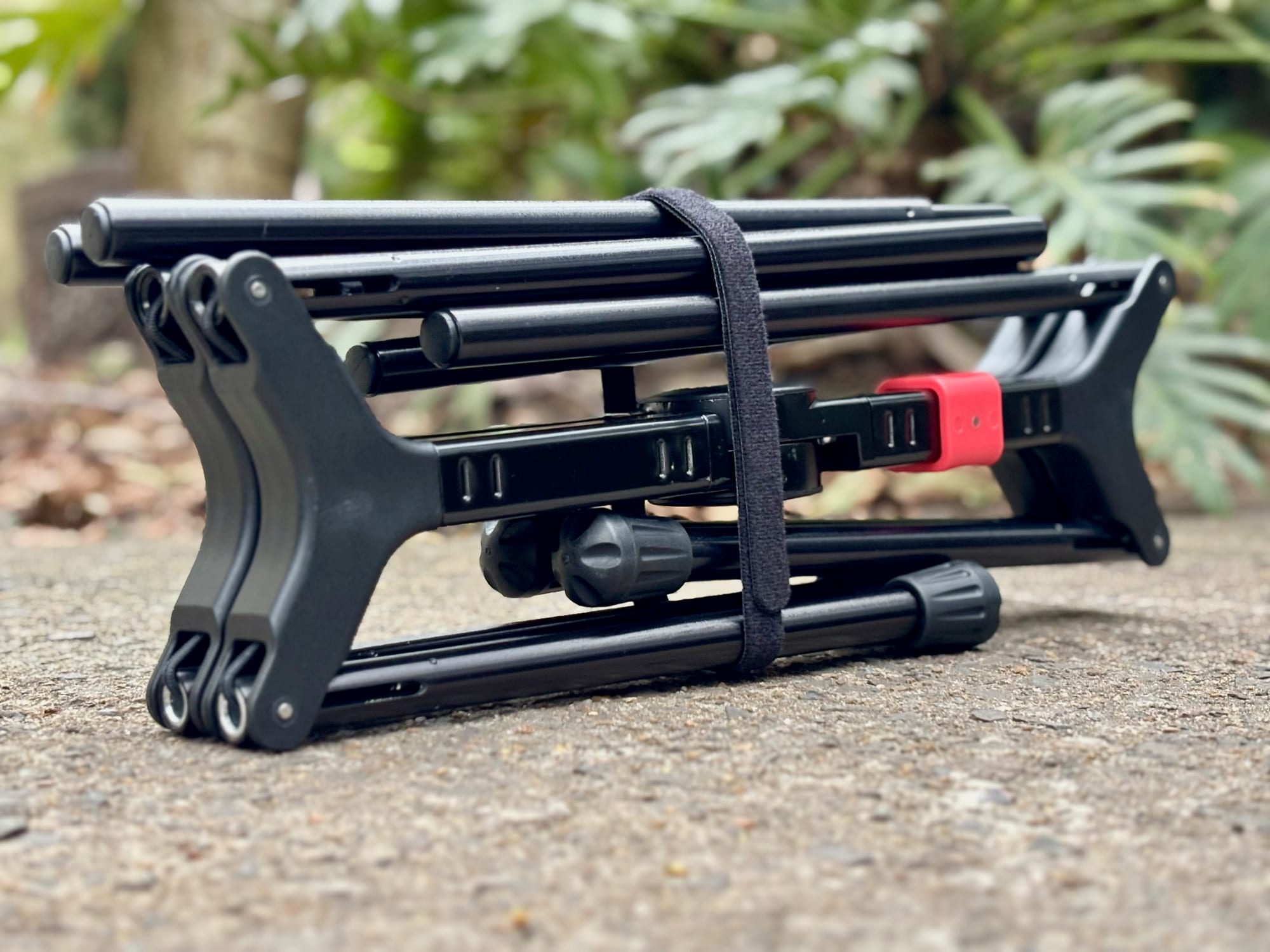 The folded YL01 frame held together with a velcro strap