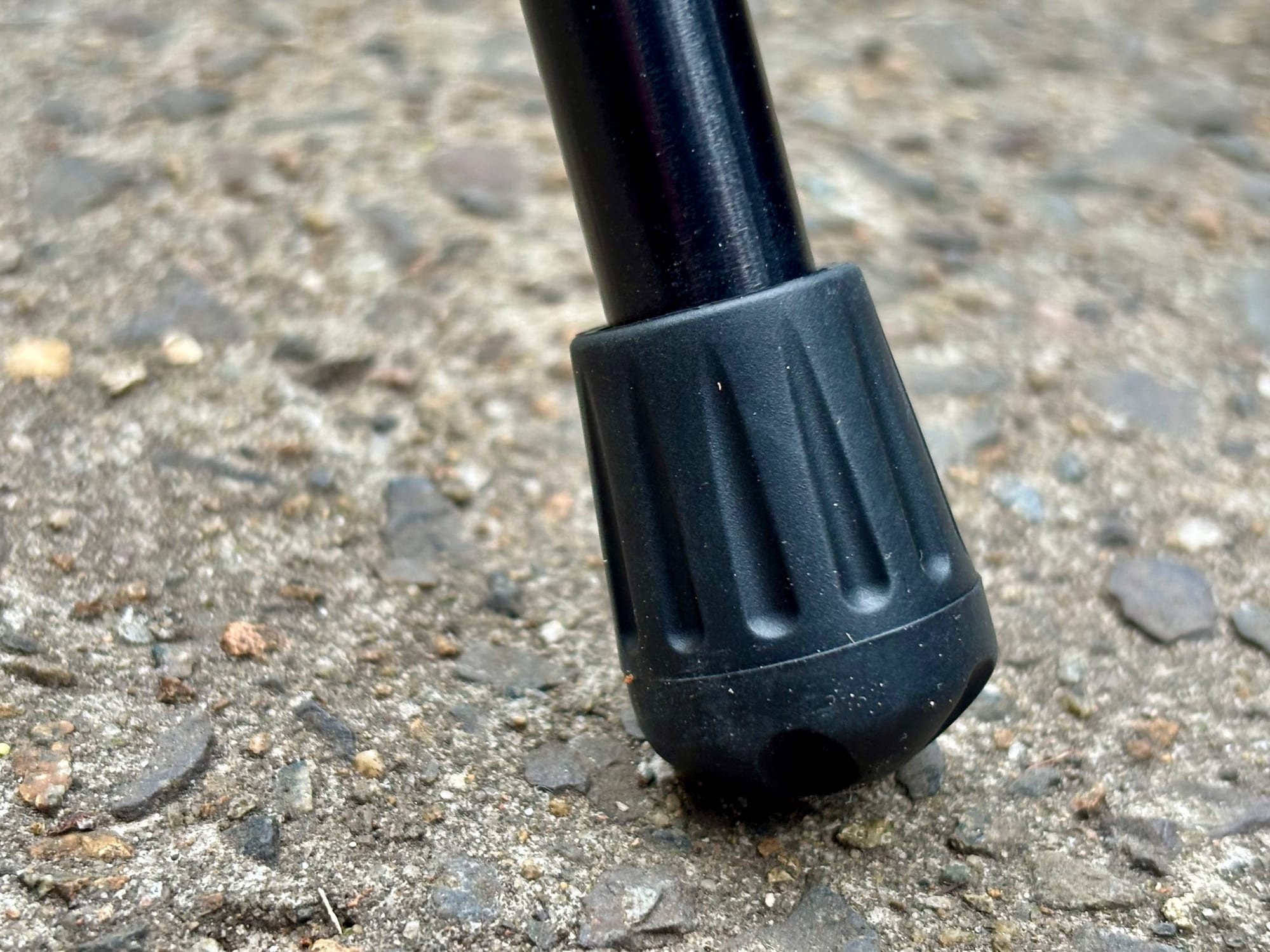 A standard plastic foot of the Naturehike YL01 on bitumen