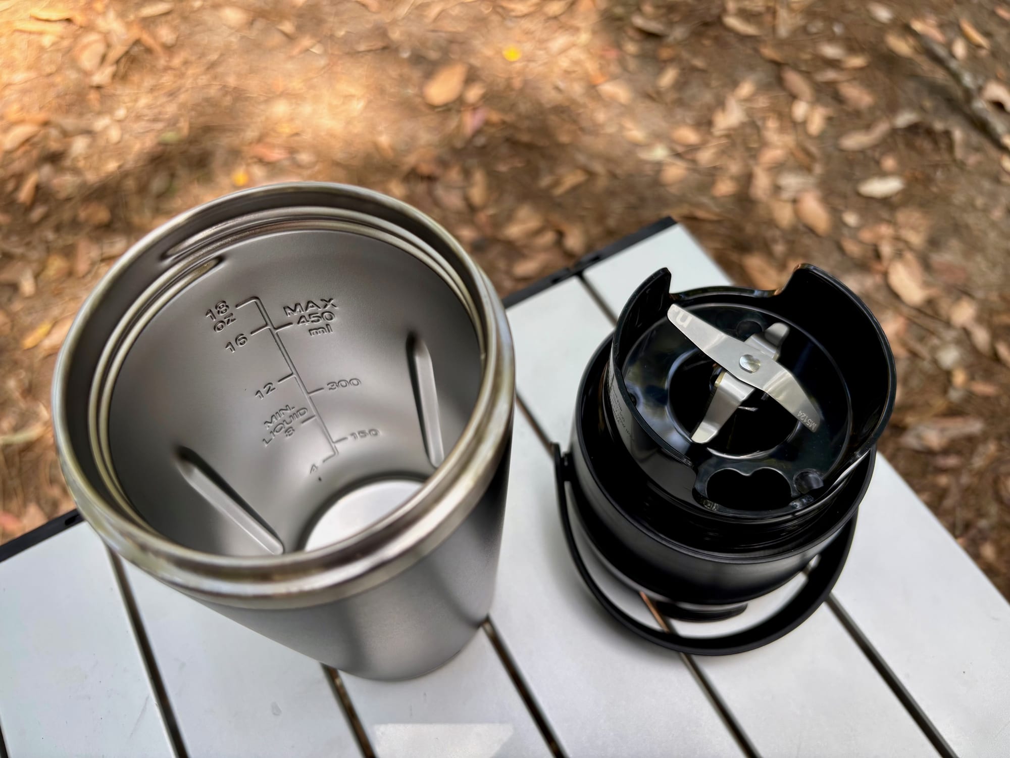 The inside of the NutriBullet Flip cup next to the blade