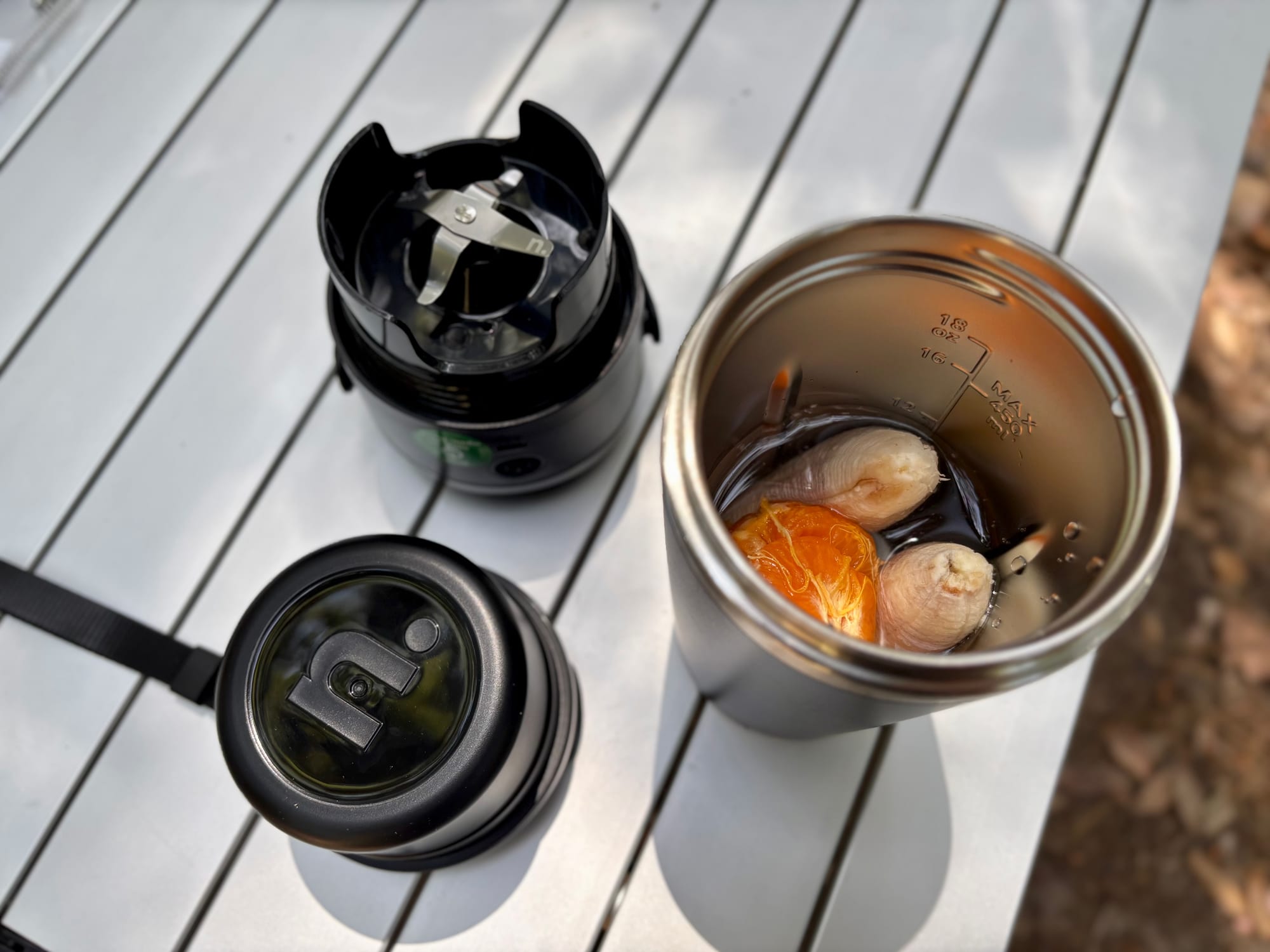 Mandarin and banana in the NutriBullet Flip cup before blending