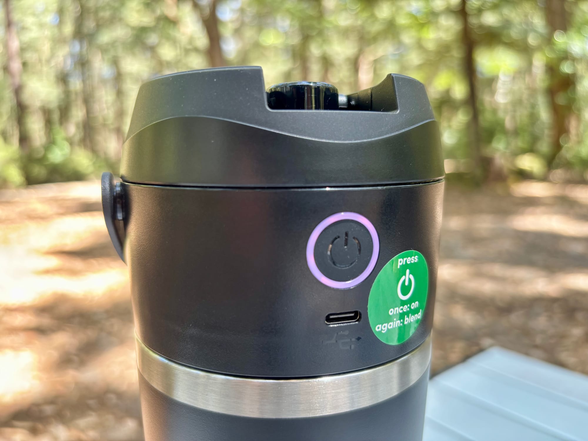The power button and USB-C port of the NutriBullet Flip