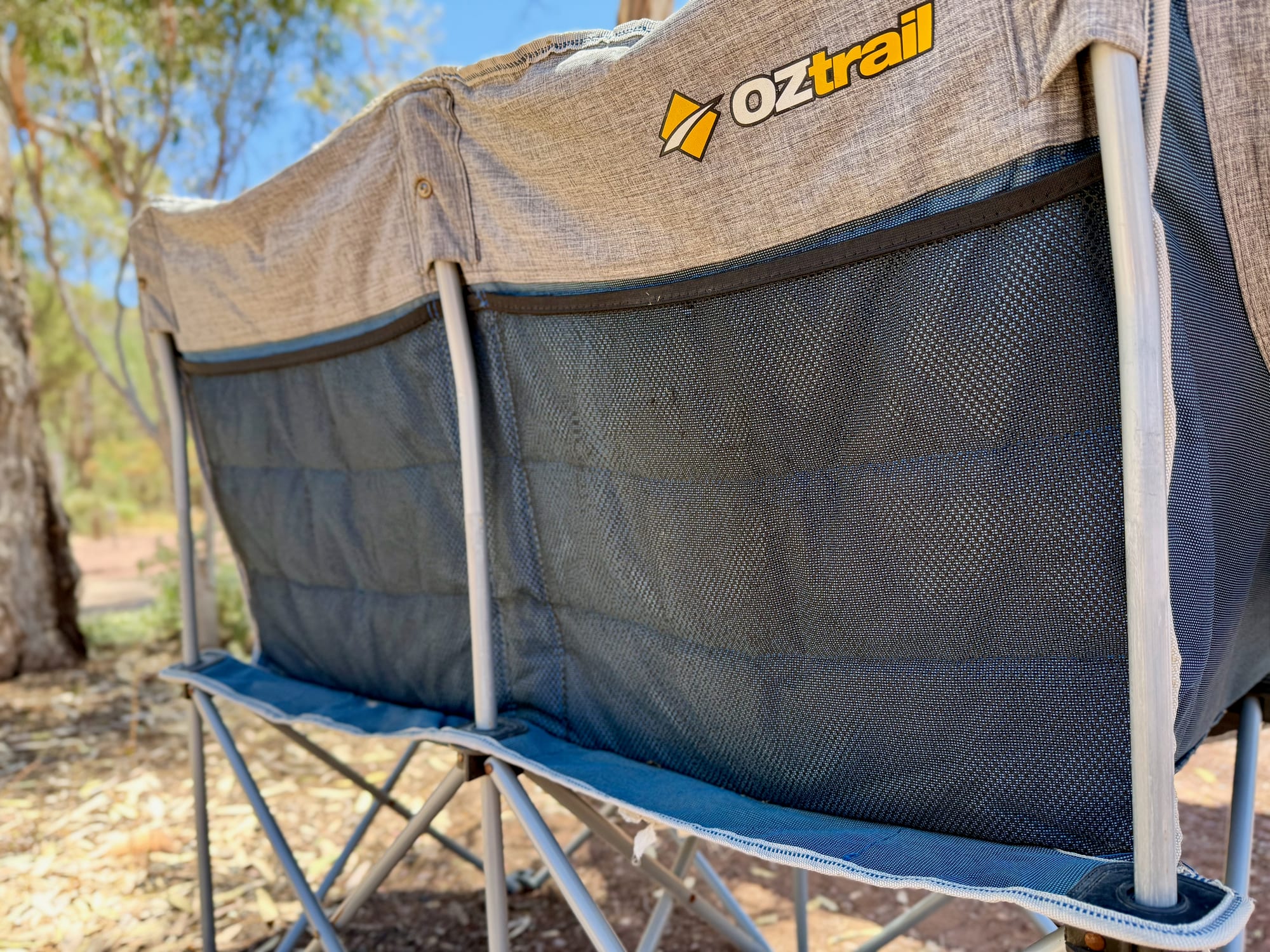The back of the OZtrail Galaxy 2 seater with two mesh pockets built into the backrest, one behind each seat