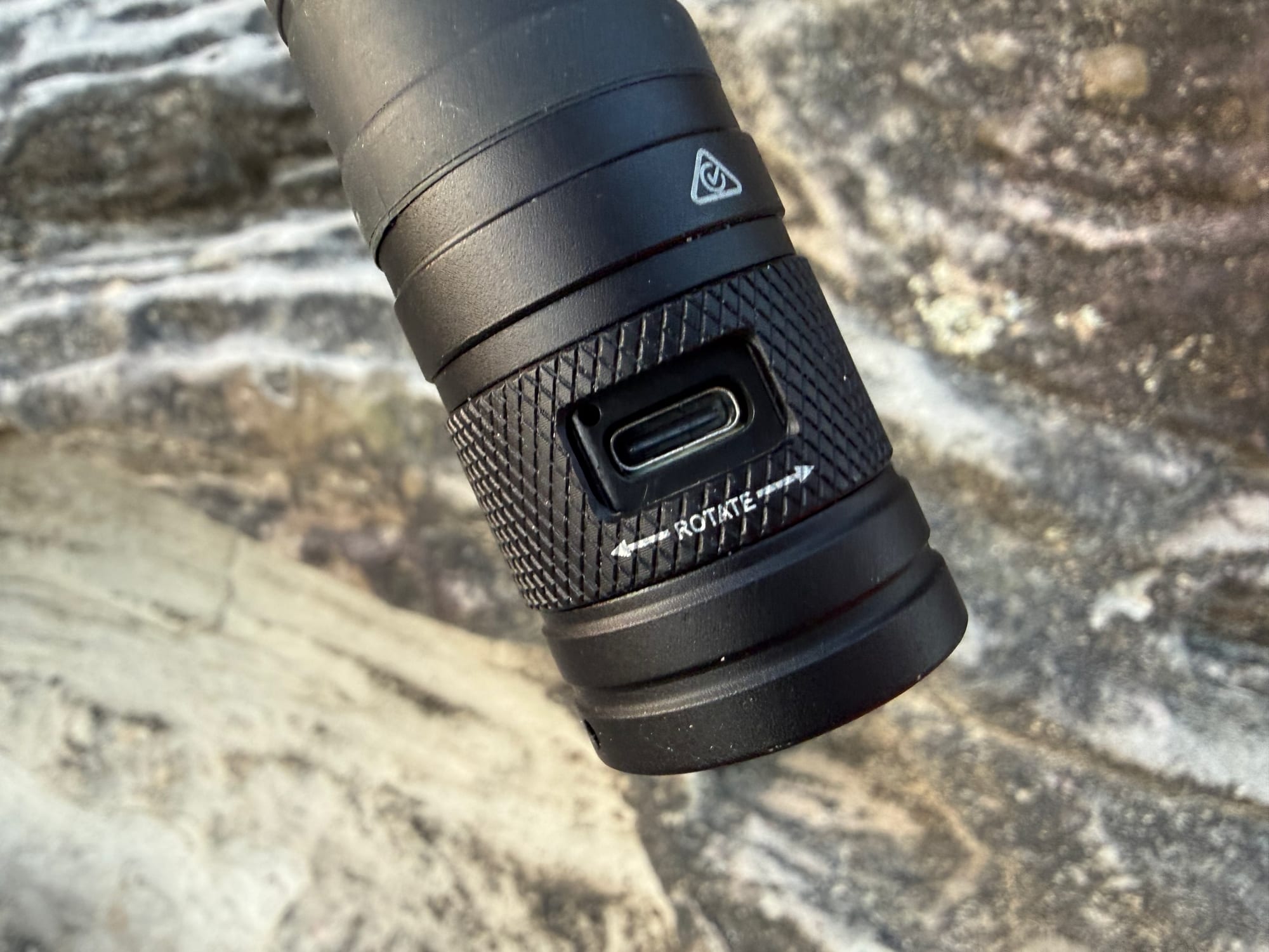 The USB-C charging port on the OZtrail FR800, uncovered under the rotating collar near the tail