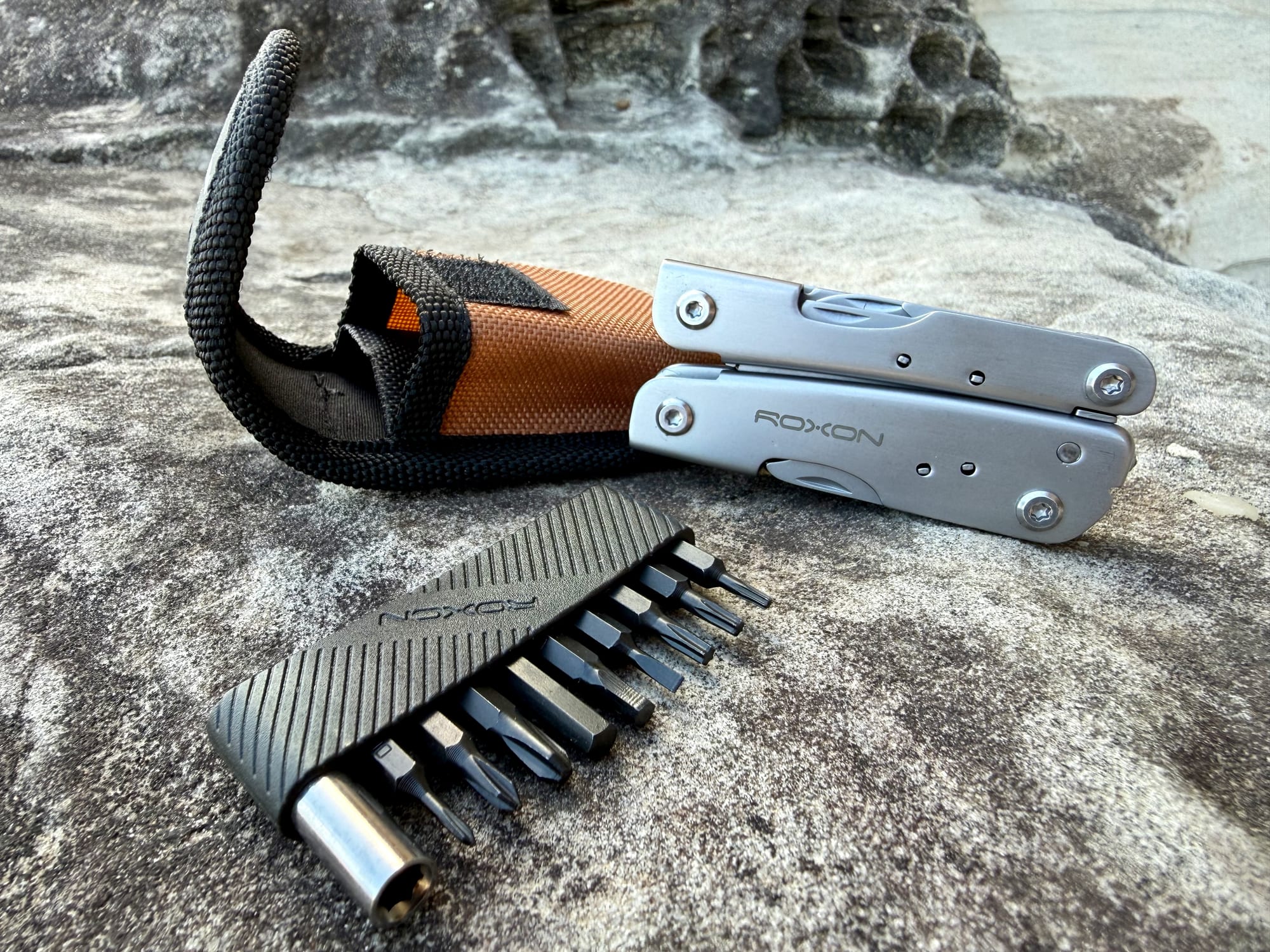The Roxon M2 with its belt pouch and the strip of driver bits