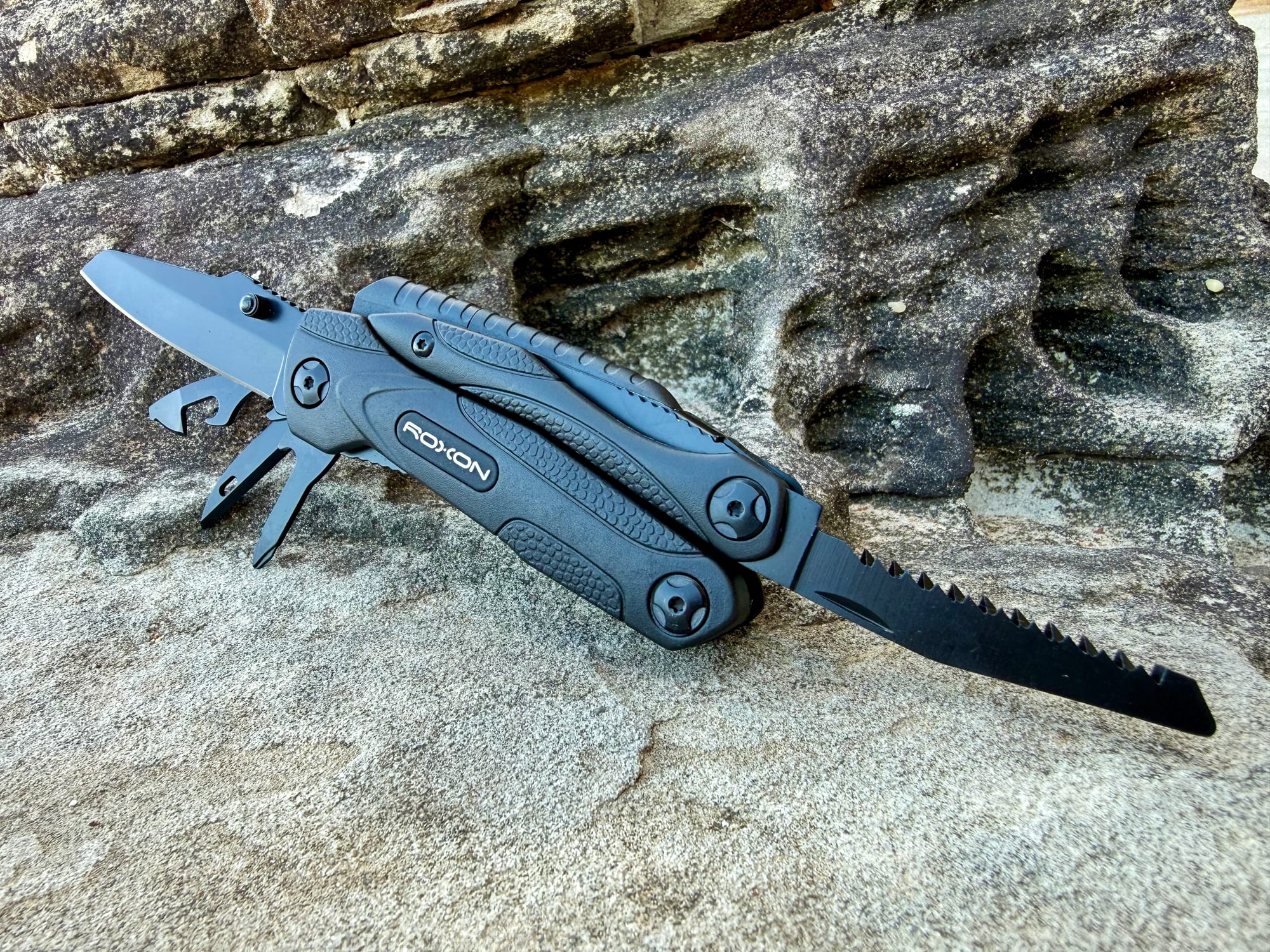 The Roxon Spark with its knife and saw folded out