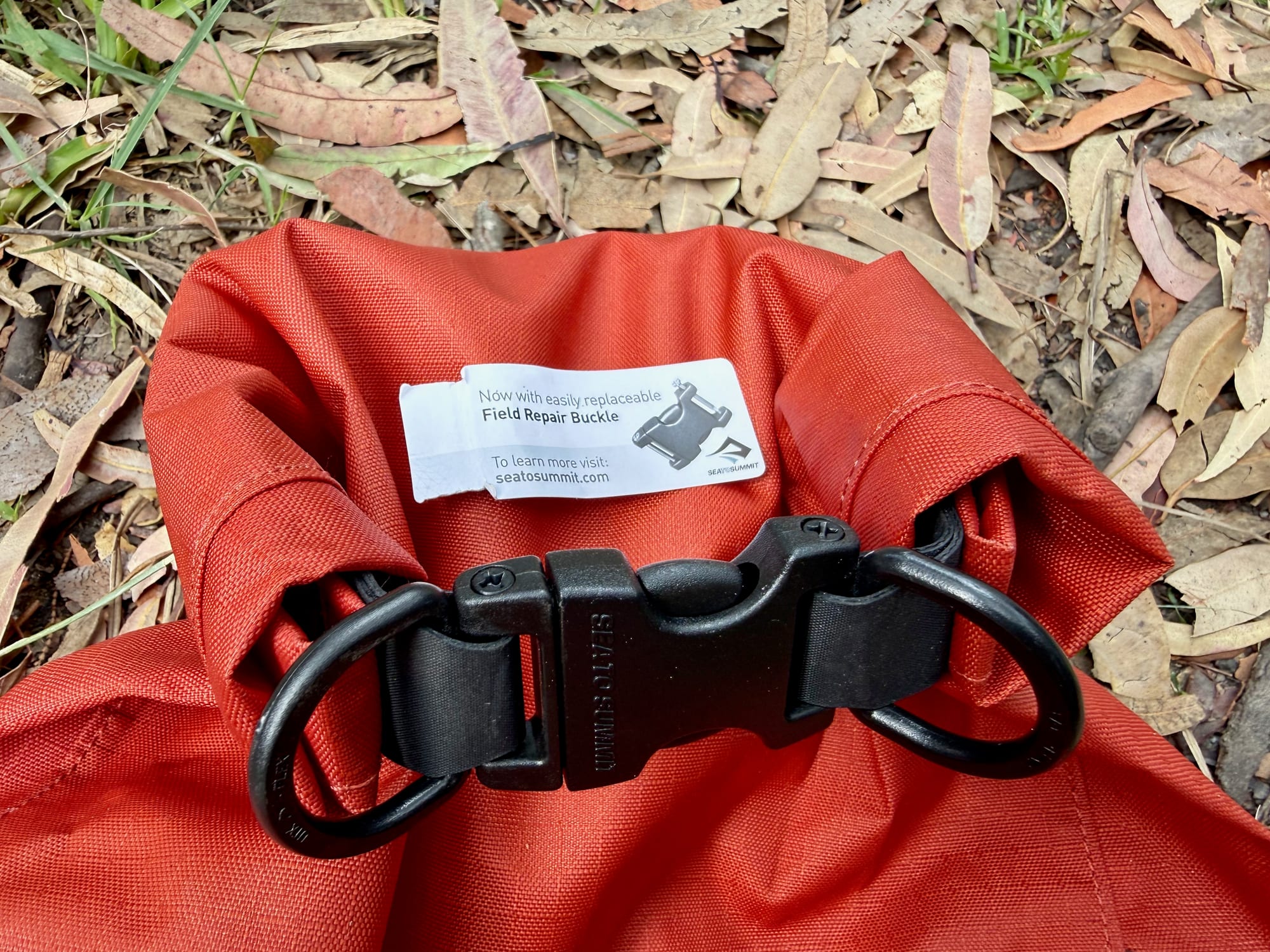 The roll top of the Big River closed with its Field Repair Buckle and two D-rings