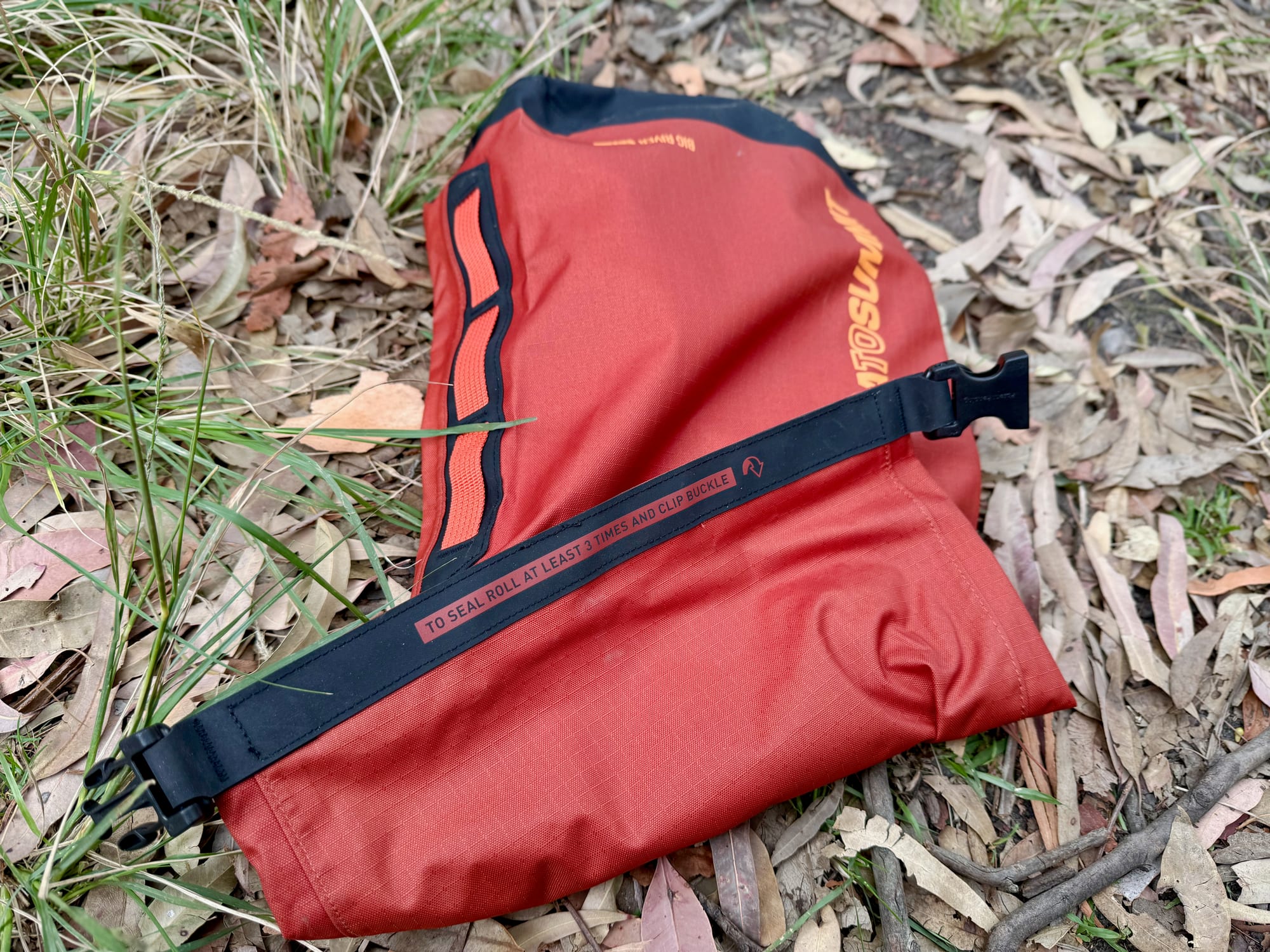 The top of the Big River dry bag folded over, ready to be rolled down at least three times