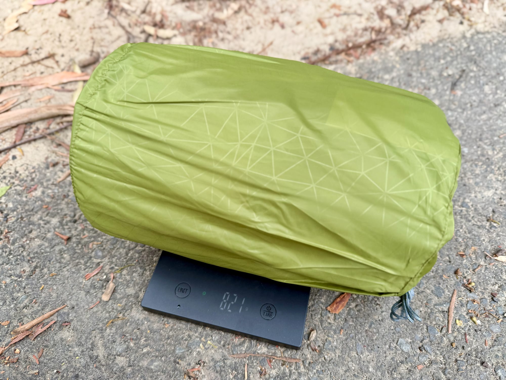 The Sea to Summit Camp Mat SI in its stuff sack on a scale