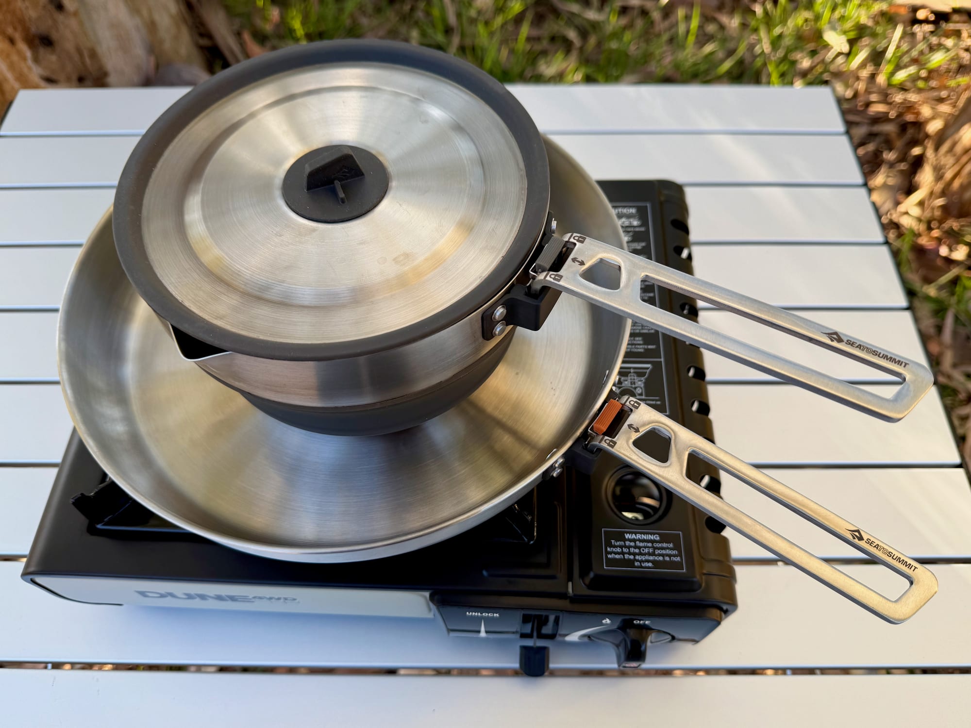 The Sea to Summit Detour Pot sitting in the Detour Pan on a Dune stove