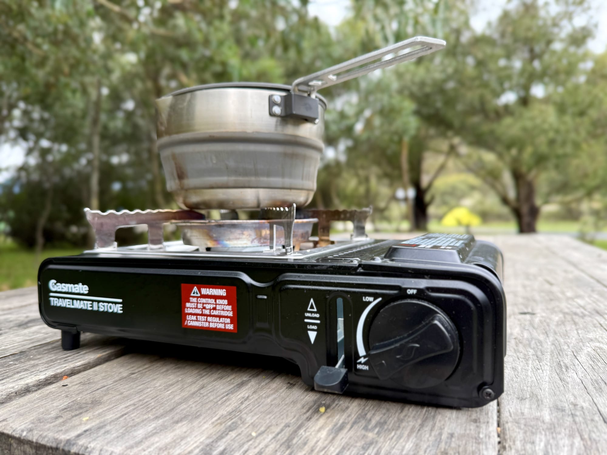 The Sea to Summit Detour Pot on a Gasmate Travelmate II stove on a campground picnic table