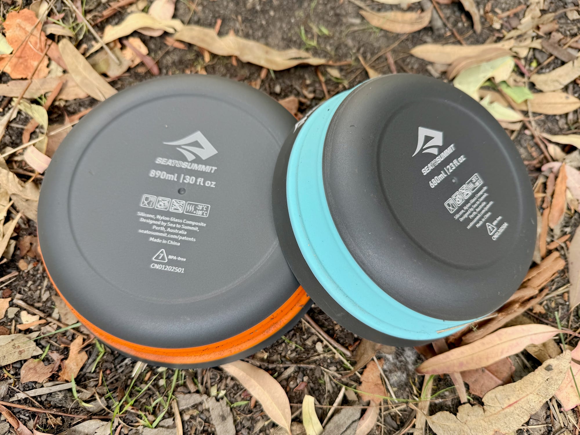 The bases of a Large and a Medium Frontier bowl, engraved 890 ml and 680 ml