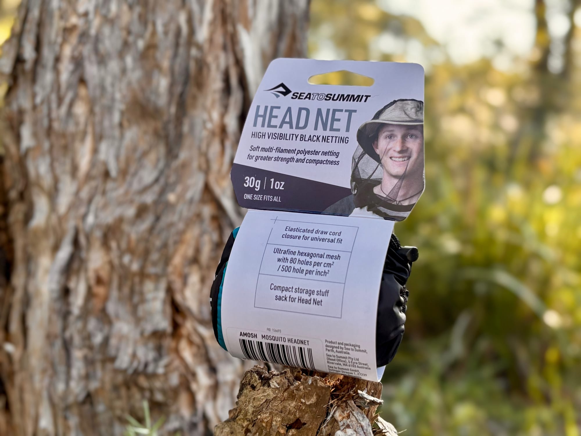 The Sea to Summit Head Net in its packaging: high visibility black netting, 30 g, one size fits all