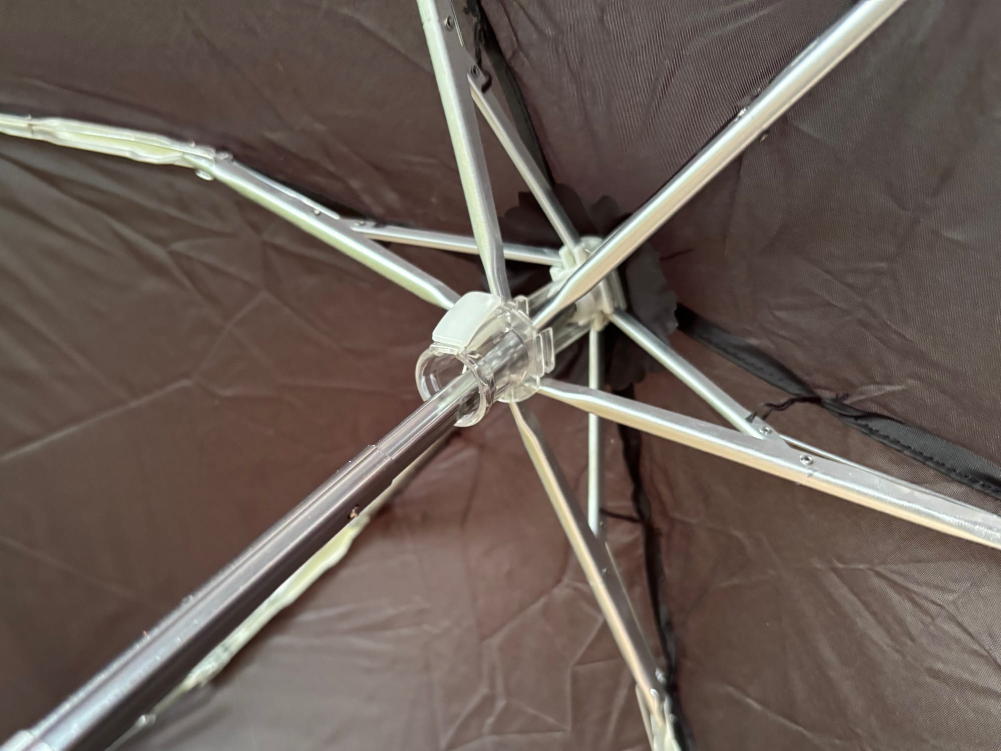 The ribs and hub of the Sea to Summit Pocket Umbrella up close