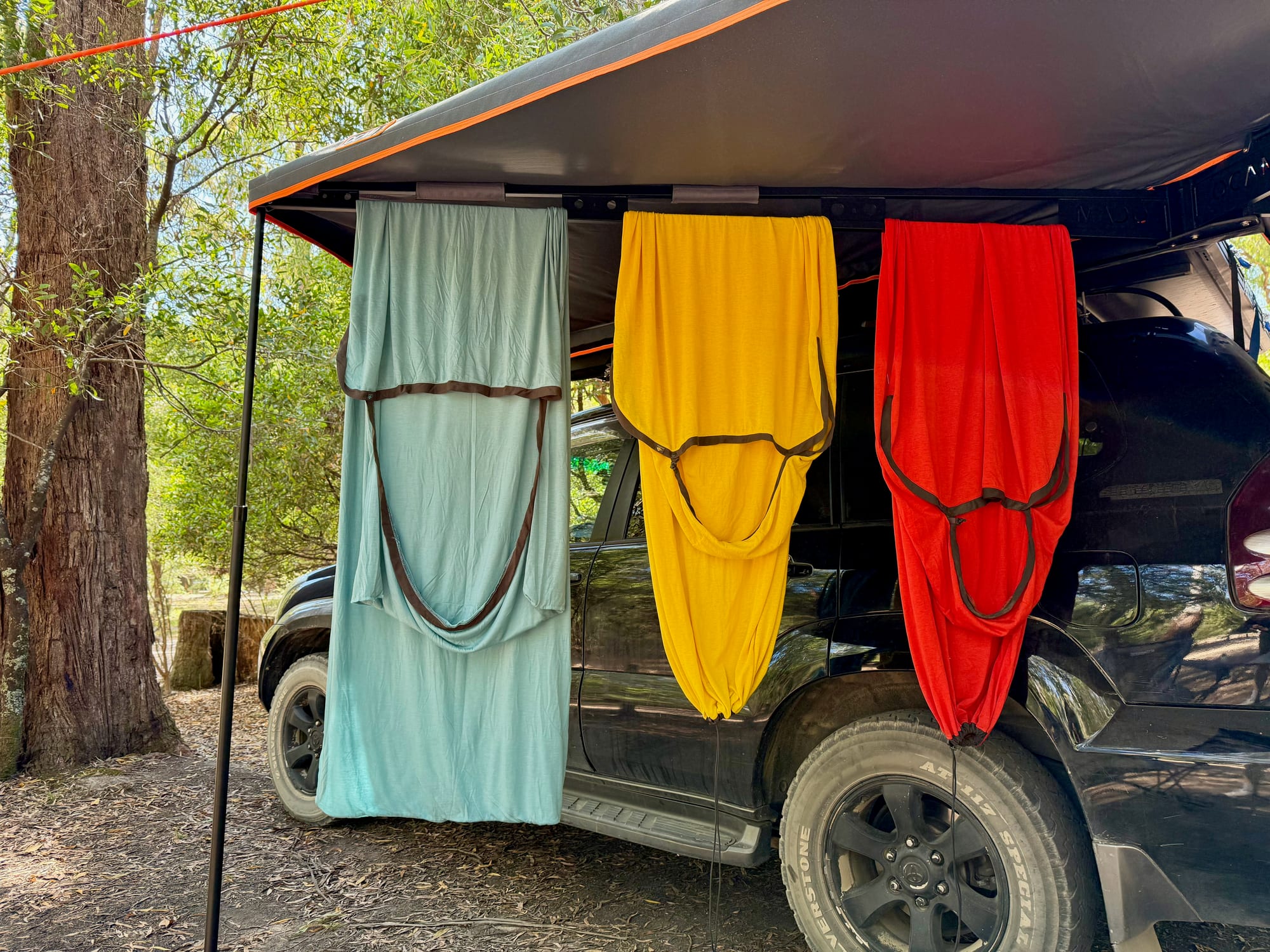 The Comfort Blend, Reactor Lightweight and Reactor Extreme liners hanging under our awning beside the Prado
