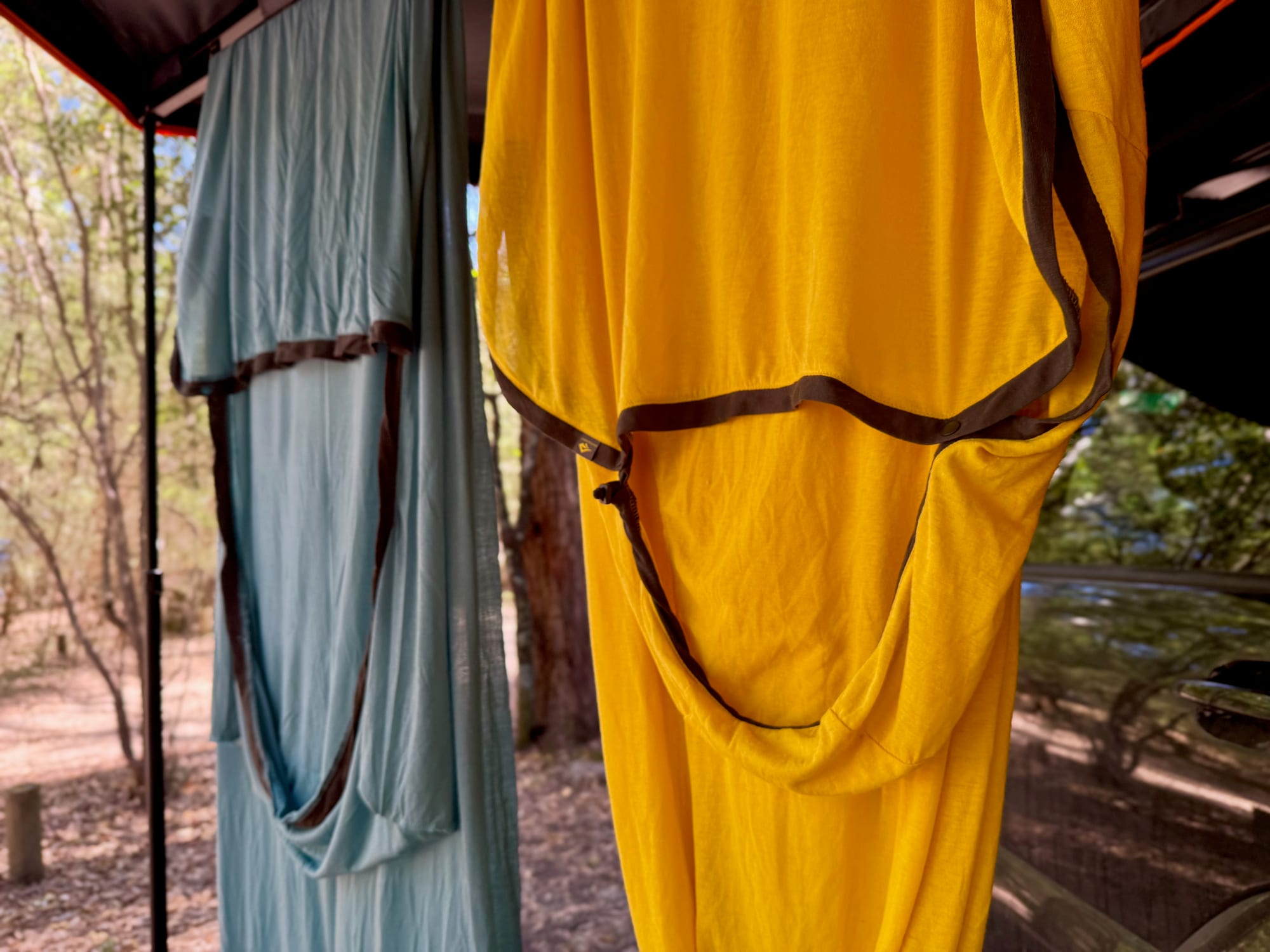 The hood of the yellow Reactor liner with its brown trim and drawcord