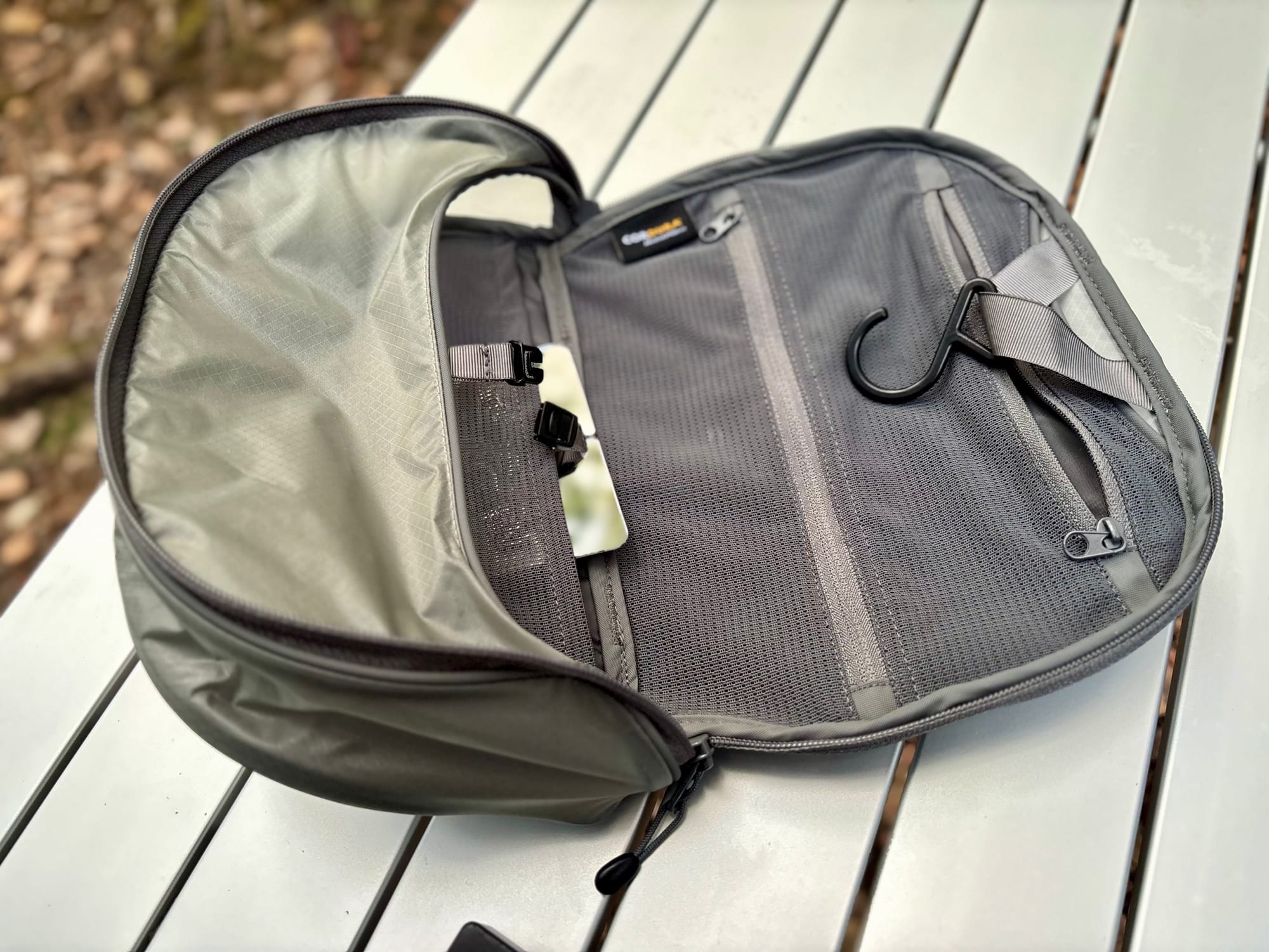 The zipped mesh pockets inside the Hanging Toiletry Bag