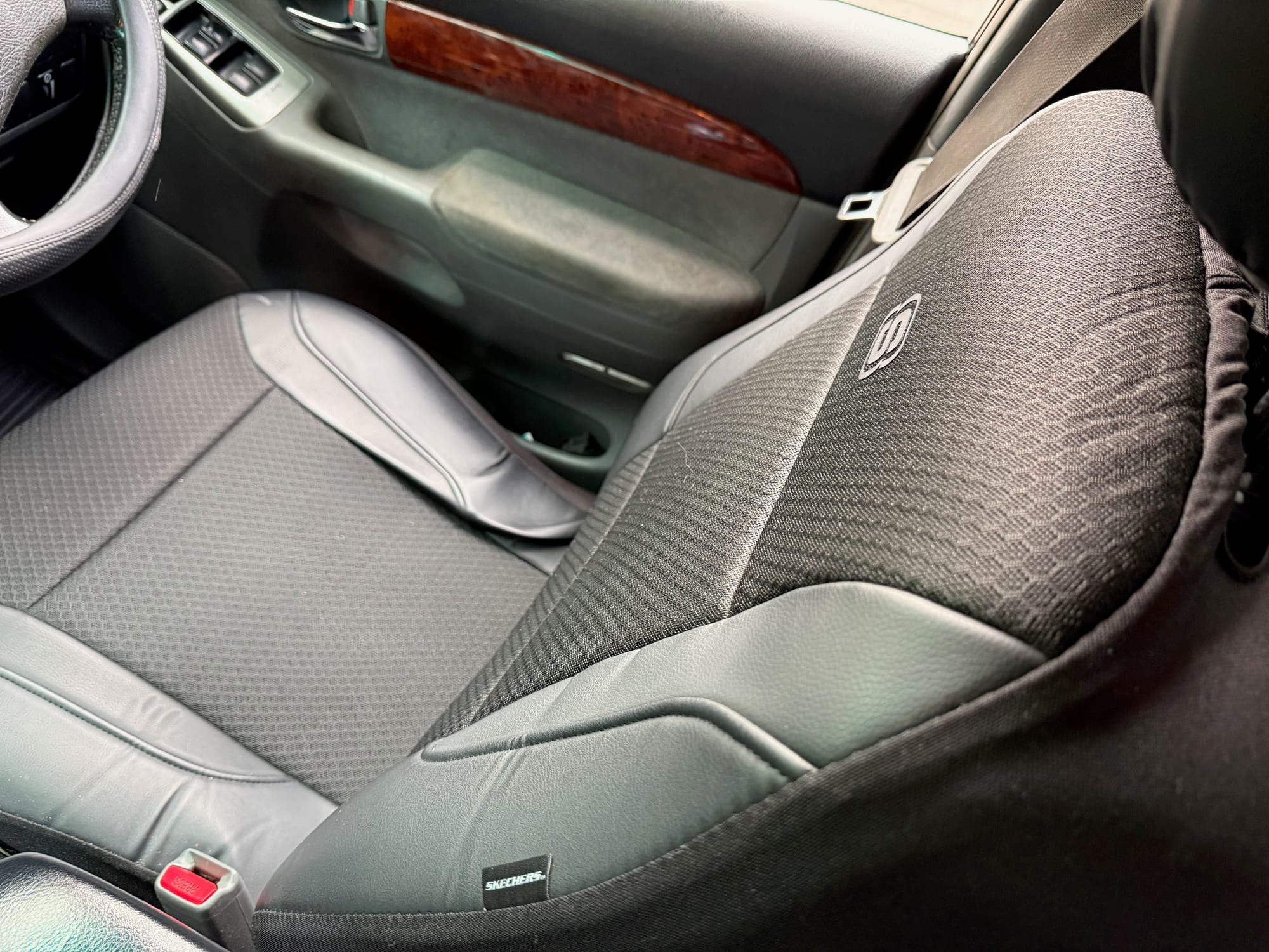The Skechers seat cover fitted snug over the seat base and backrest of a 4WD front seat