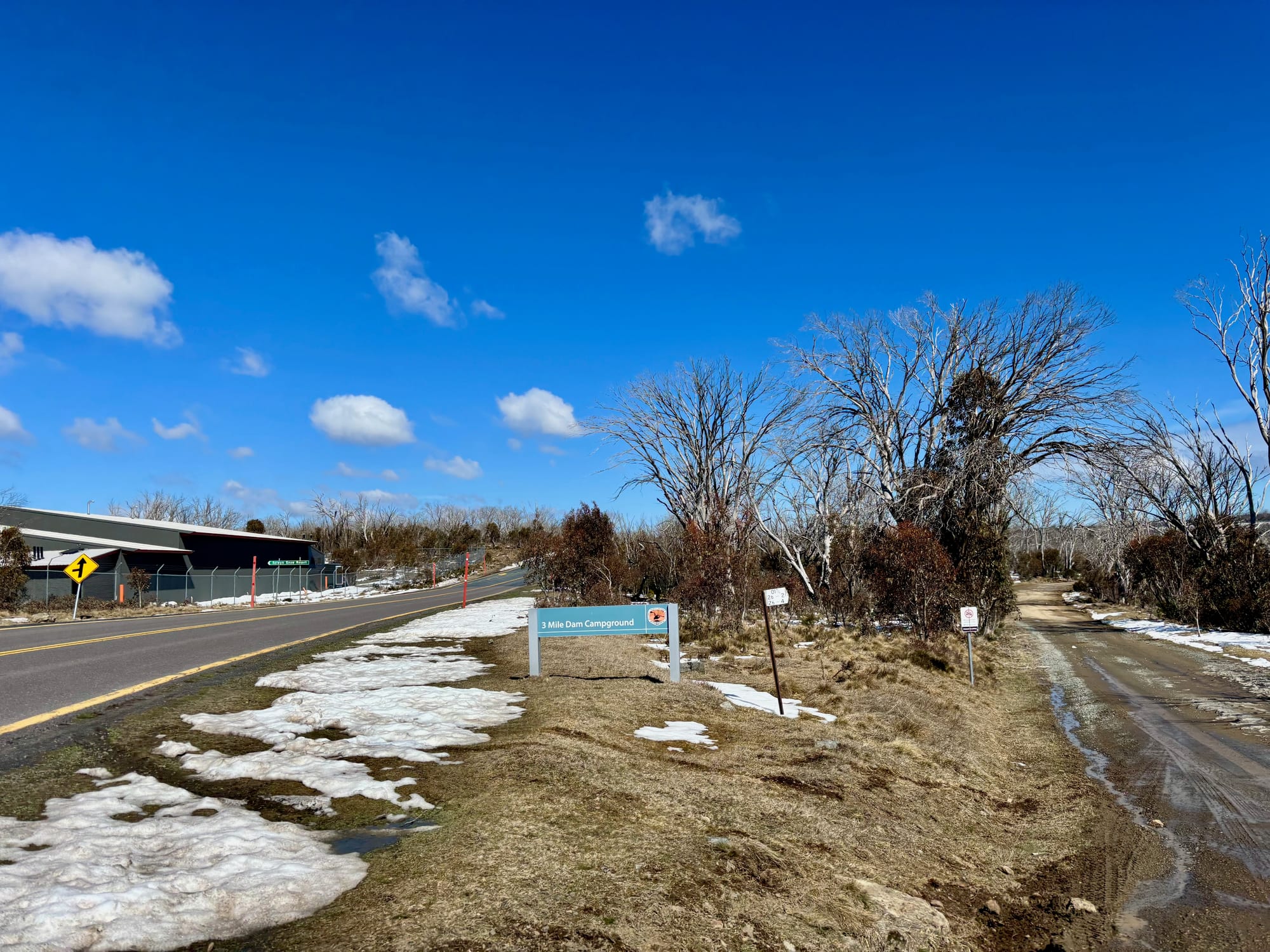 The turn-off to Three Mile Dam Campground on Link Road: the campground sign and the gravel track in on the right
