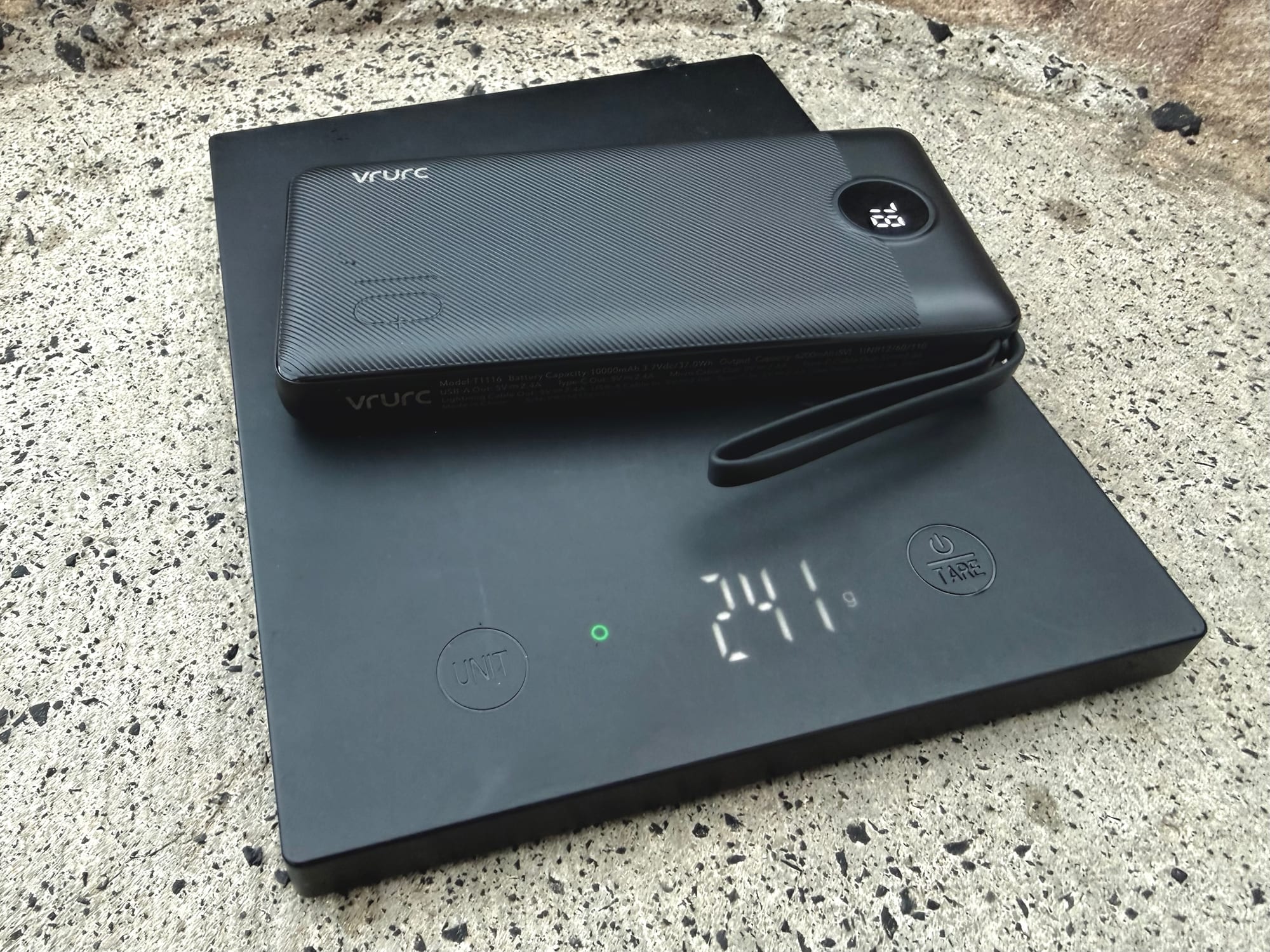 The VRURC 10,000mAh power bank on the scale at 241 g