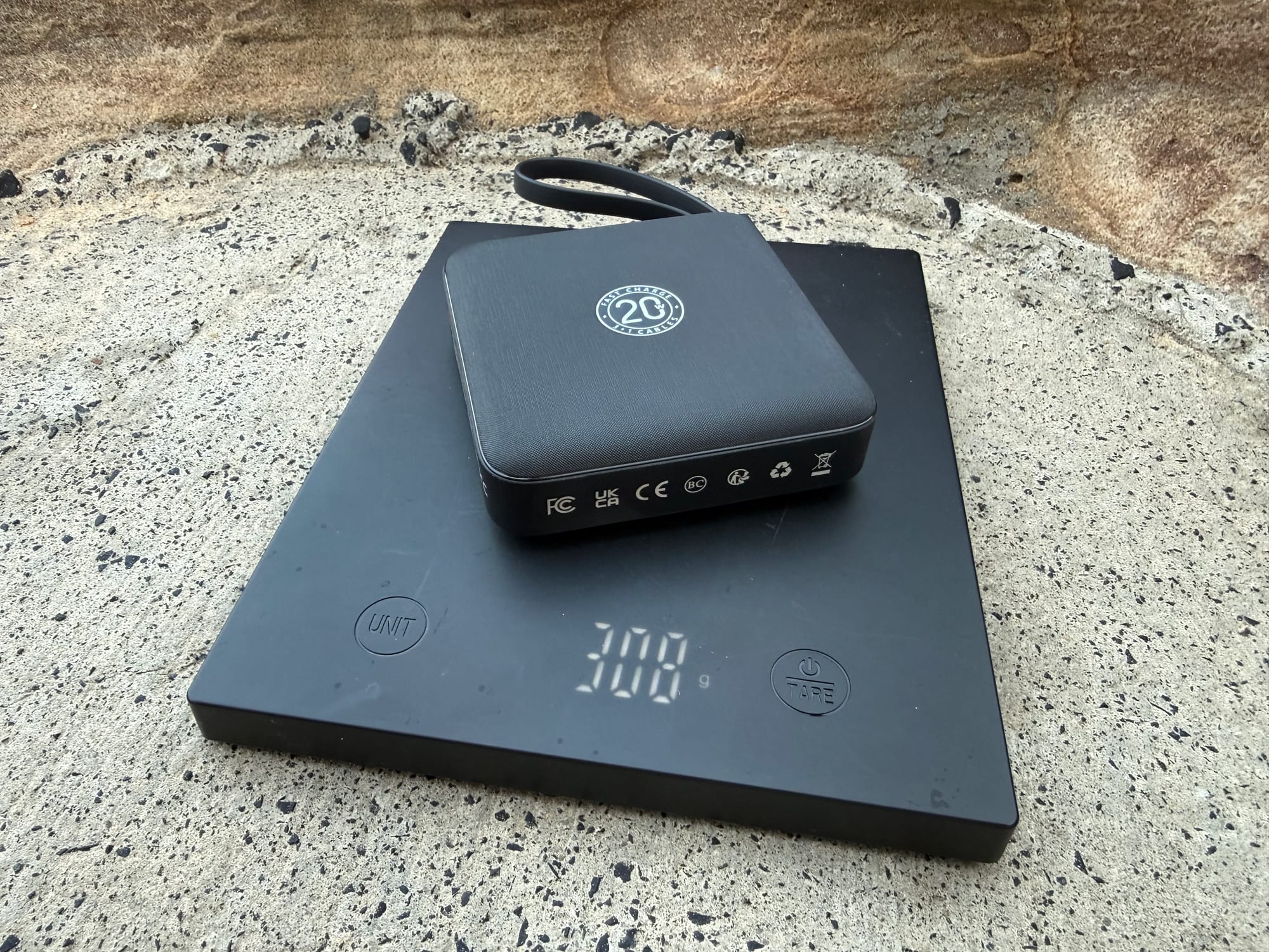 The VRURC 20,000mAh power bank on the scale at 308 g