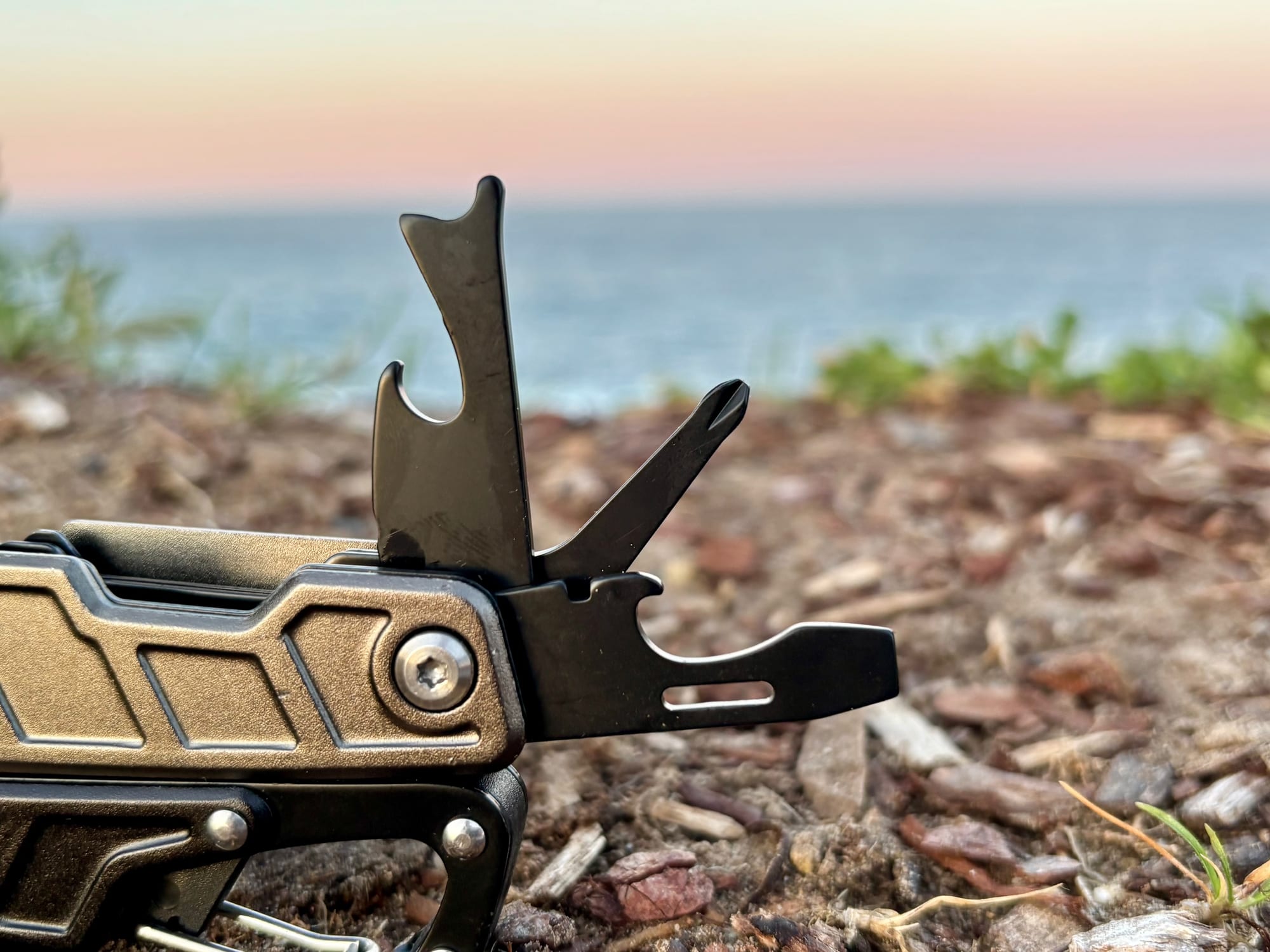 The bottle opener, can opener and screwdrivers of the Workpro 11-in-1 multitool fanned out