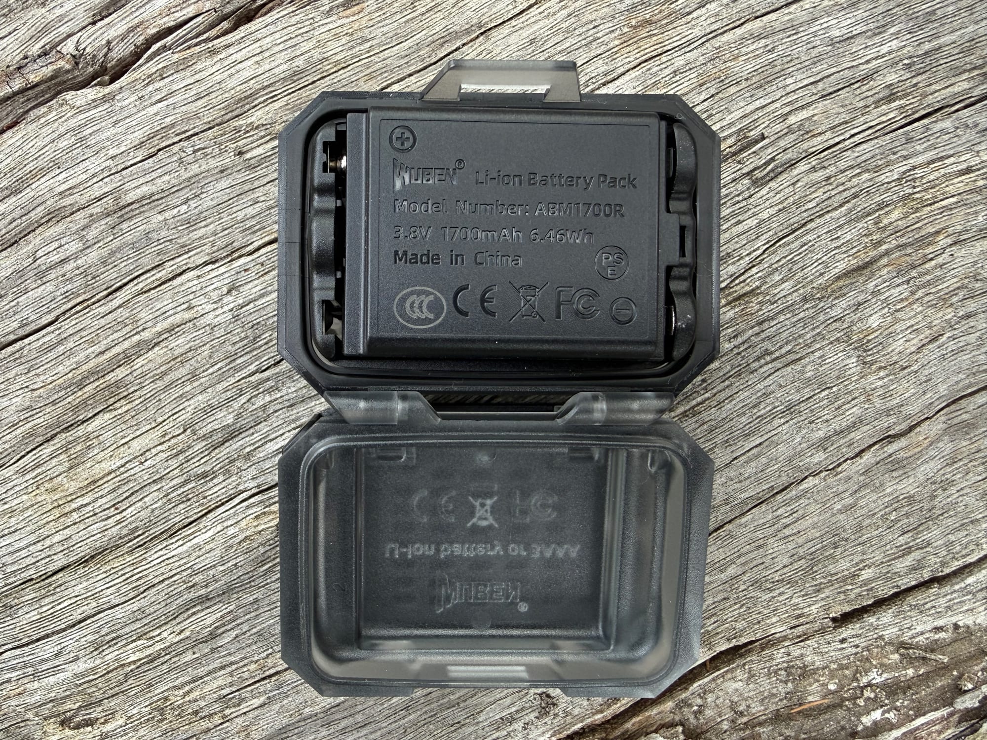 The Wuben ABM1700R 1700 mAh battery pack in its open case