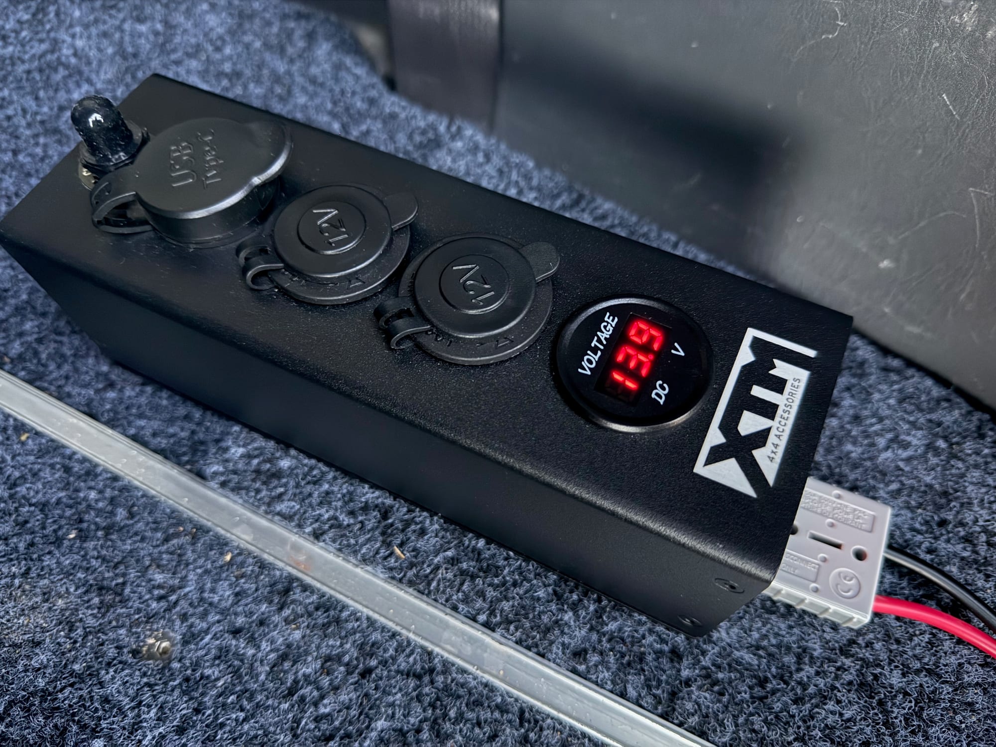 The LED voltmeter of the XTM Distribution Panel showing the battery voltage
