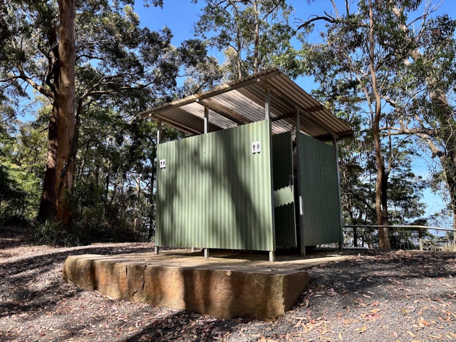 The green long-drop toilet block at Heaton Lookout